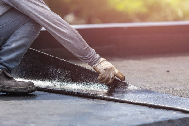 Professional Exterior Waterproofing technician working in Bringhurst, IN